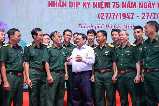 Thủ tướng Chính phủ Phạm Minh Chính gặp mặt các đội tìm kiếm, quy tập hài cốt liệt sĩ - Ảnh: VGP/Nhật Bắc