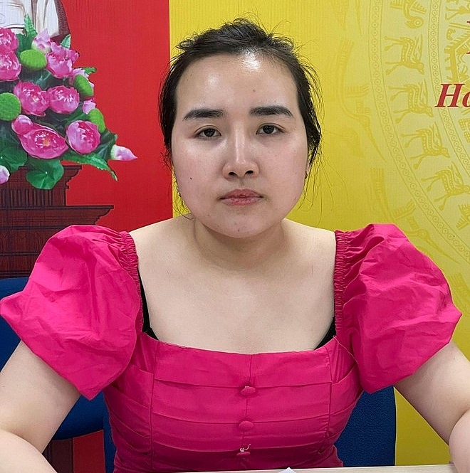 Lê Thị Mai Linh tại cơ quan công an. 