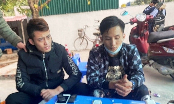 Đào Văn Minh (trái) và Lê Mạnh Long khi bị bắt