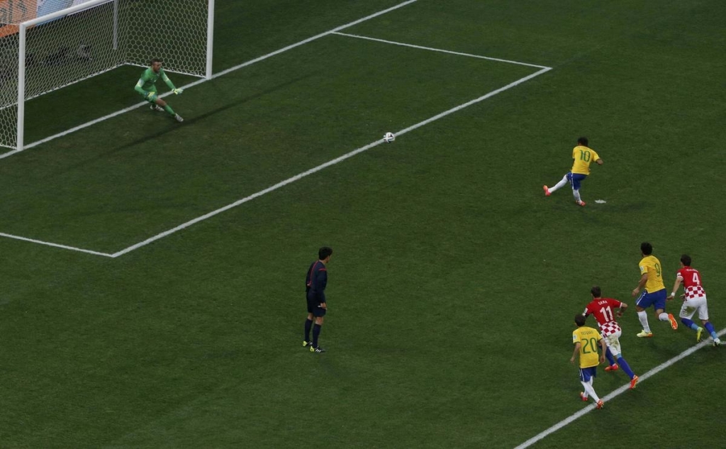 Brazil’s Neymar scores a penalty during the 2014 World Cup opening match against Croatia. | Photo Credit: Paulo Whitaker