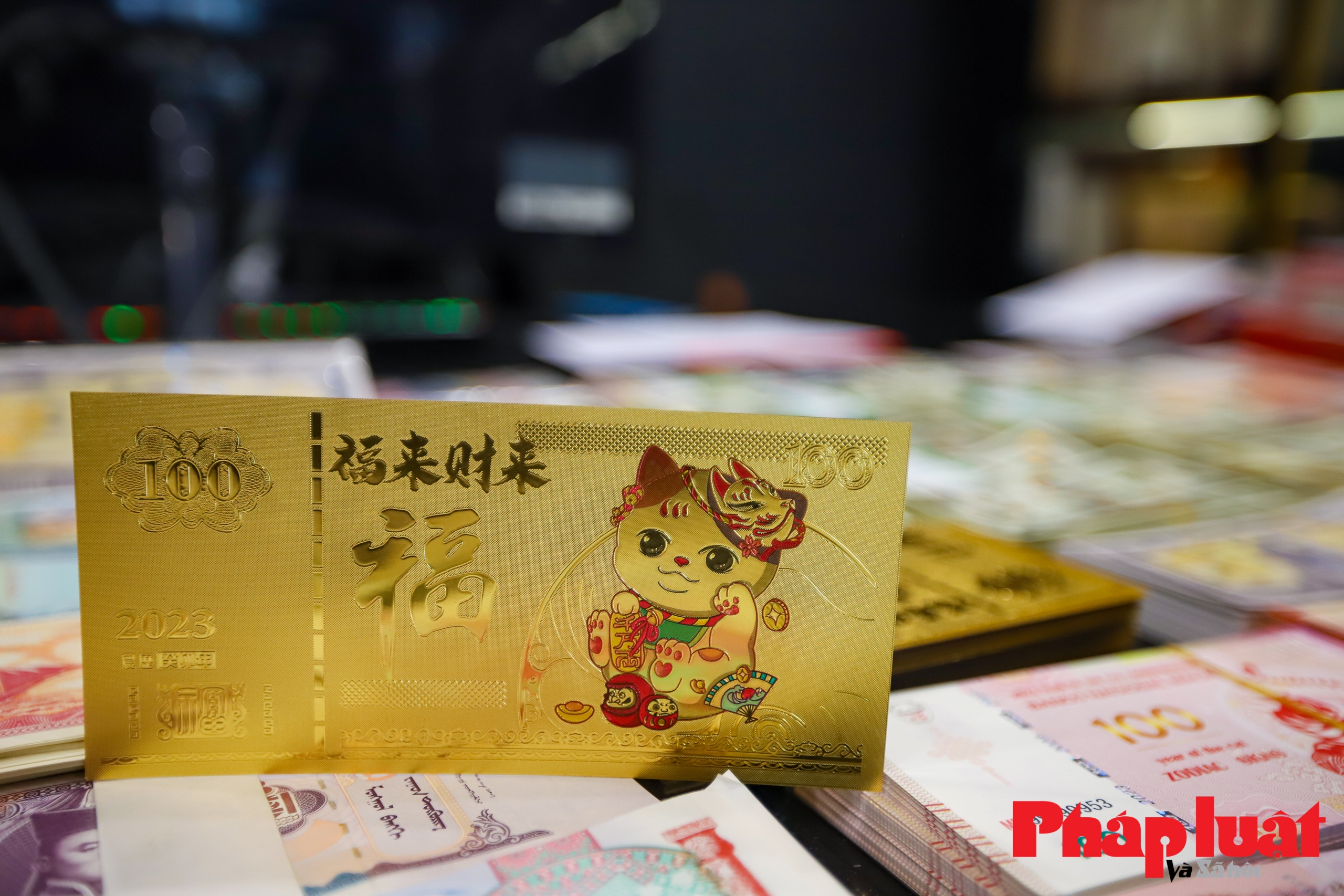 Tiền lì xì in hình mèo cháy hàng dịp Tết Quý Mão 2023