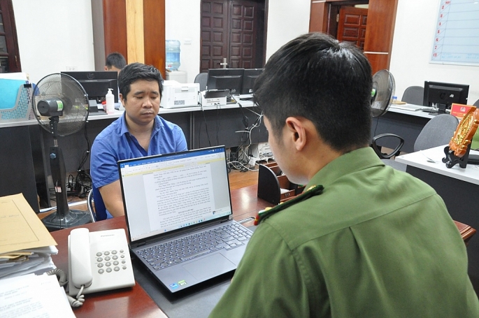 Đàm Thanh Tùng tại cơ quan công an.