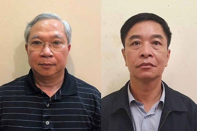 -	Cựu Chủ tịch HĐQT VEC Mai Tuấn Anh (trái) và cựu Tổng Giám đốc VEC Trần Văn Tám khi mới bị bắt.