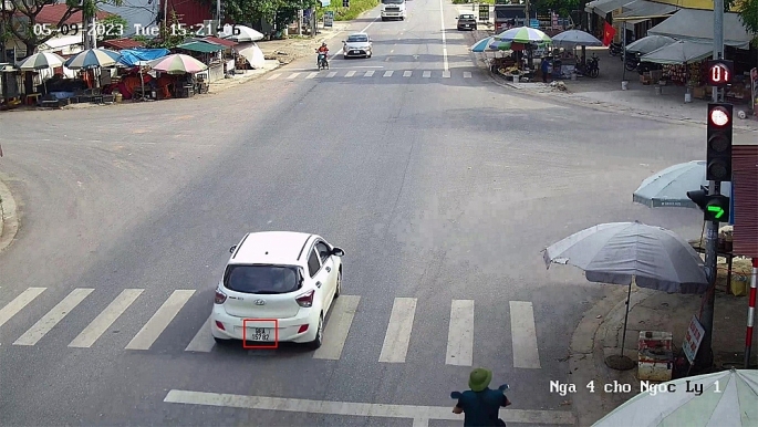 Xe ô tô biển số 98A-157.82 vi phạm “không chấp hành hiệu lệnh của đèn tín hiệu giao thông”.