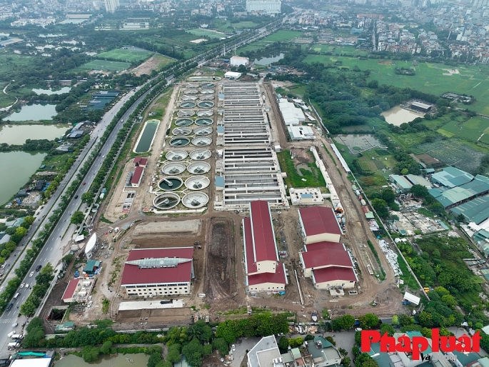 Dự án nhà máy xử lý nước thải Yên Xá được kỳ vọng làm hồi sinh các dòng sông Tô Lịch, sông Lừ, sông Sét và một phần sông Nhuệ. Dự án được khởi công từ tháng 10/2016 đến nay đã hoàn thành hơn 93%. Ảnh: Khánh Huy Dự án nhà máy xử lý nước thải Yên Xá được kỳ vọng làm hồi sinh các dòng sông Tô Lịch, sông Lừ, sông Sét và một phần sông Nhuệ. Dự án được khởi công từ tháng 10/2016 đến nay đã hoàn thành hơn 93%. Ảnh: Khánh Huy