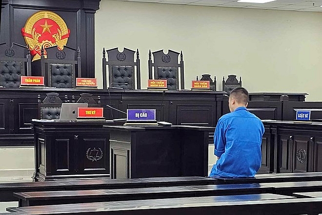 Bị cáo tại Hùng tại phiên tòa sơ thẩm. Ảnh: Nhật Nam