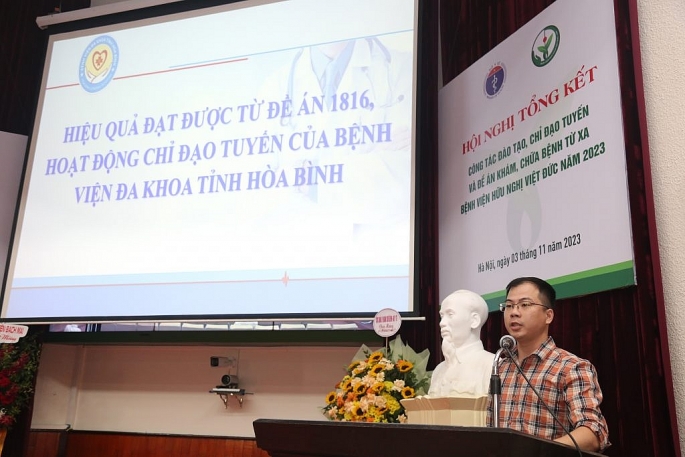 Đại diện cơ sở y tế vệ tinh báo cáo về việc thực hiện Đề án 1816 BV Hữu nghị Việt Đức năm 2023.             Ảnh: BV Việt Đức