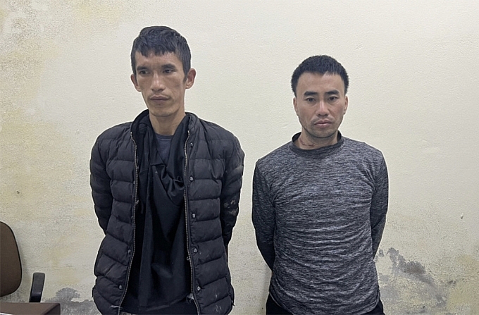 Phạm nhân Phan Công Thành và Nguyễn Đắc Hoàng khi bị bắt trở lại trại giam.		 Ảnh: CACC