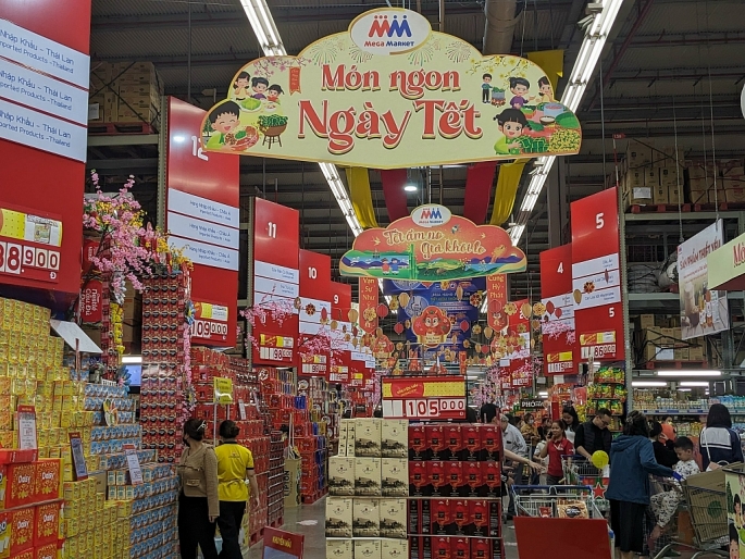 Khách hàng mua sắm tại Siêu thị Mega Market Thăng Long, Hà Nội.	Ảnh: Phúc Nguyễn