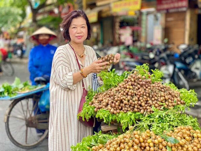 Mùa hồng bì chín đi qua phố Hà thành