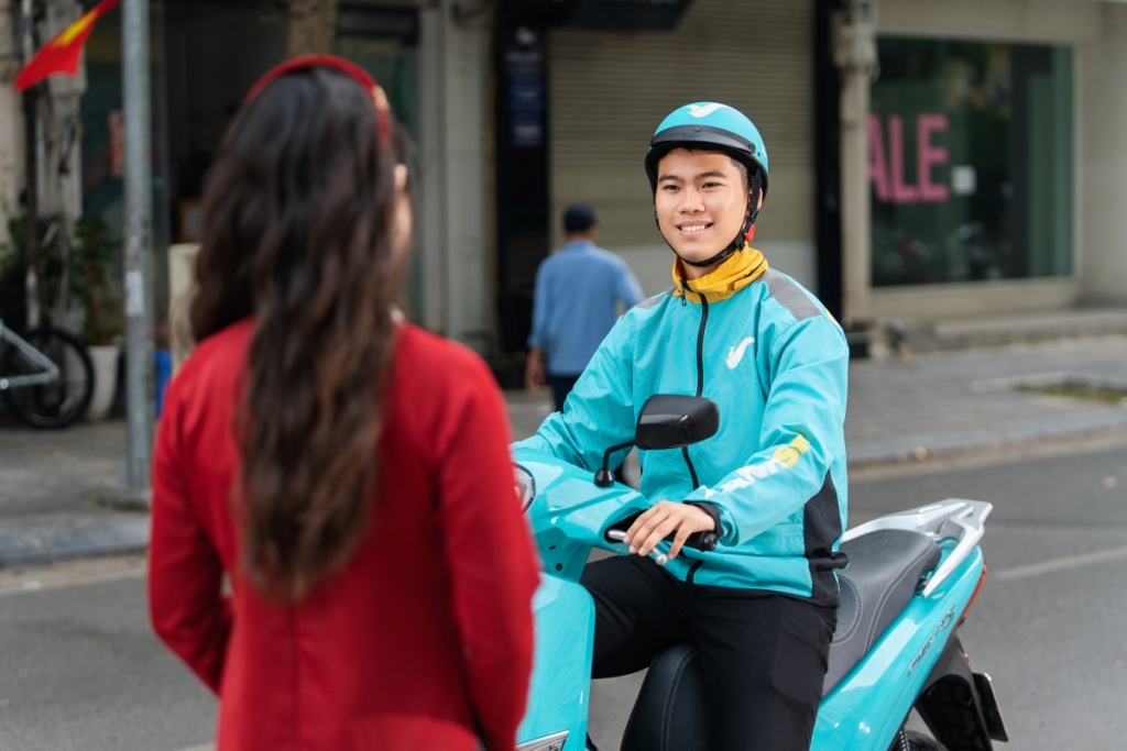  Trang phục sạch sẽ, gọn gàng của tài xế Xanh SM Bike là điểm khách hàng đánh giá cao 