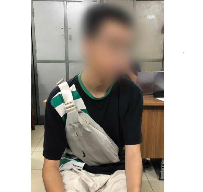 Cháu K tại cơ quan công an. Ảnh: CQCA Cháu K tại cơ quan công an. Ảnh: CQCA