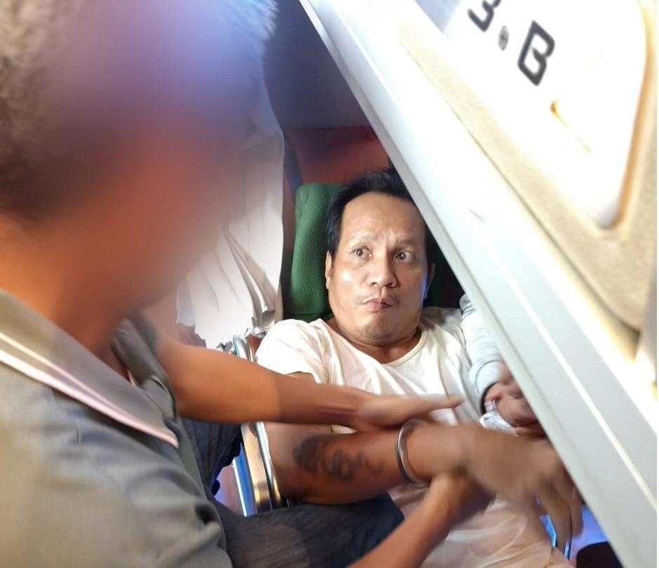 Đối tượng truy nã nguy hiểm Phạm Anh Tuấn thời điểm bị bắt giữ. Ảnh: CQCA