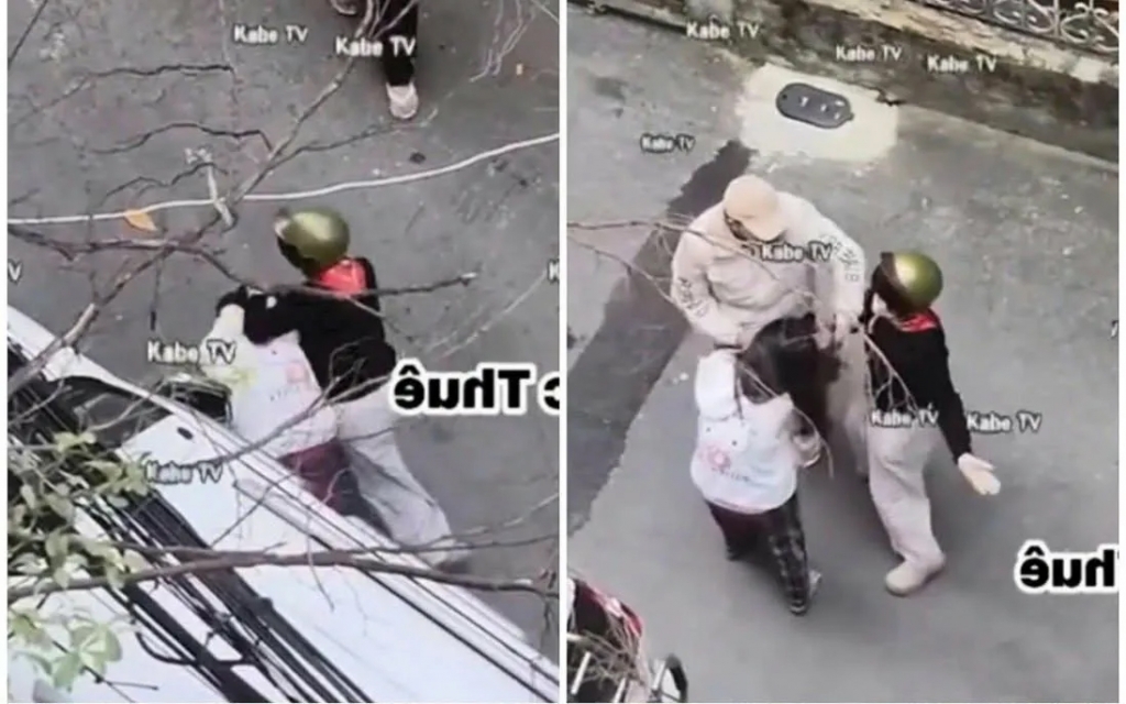 Hành ảnh người phụ nữ túm tóc, tát liên tục vào mặt nữ sinh được camera an ninh ghi lại. Ảnh cắt từ clip Hành ảnh người phụ nữ túm tóc, tát liên tục vào mặt nữ sinh được camera an ninh ghi lại. Ảnh cắt từ clip