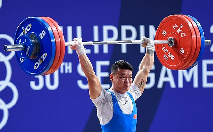 Thạch Kim Tuấn - một trong 3 vận động viên cử tạ giành suất tham dự Olympic Tokyo 2020.