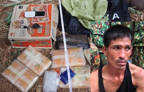 Xêng Phêng Say và tang vật 38.000 viên ma túy tổng hợp bị bắt khi đang vận chuyển qua biên giới. Ảnh: bienphong.com.vn.