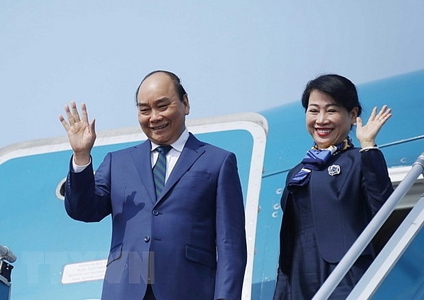 Chủ tịch nước Nguyễn Xuân Phúc và Phu nhân lên đường thăm cấp Nhà nước tới Cộng hòa Singapore. (Ảnh: Thống Nhất/TTXVN)