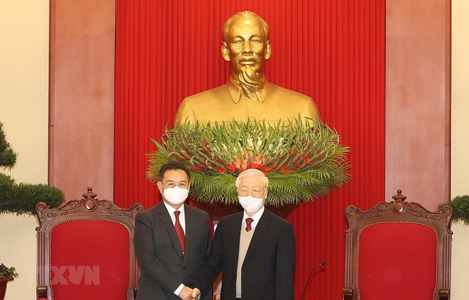 Tổng Bí thư Nguyễn Phú Trọng tiếp Chủ tịch Quốc hội Lào Xaysomphone Phomvihane. (Ảnh: Trí Dũng/TTXVN)