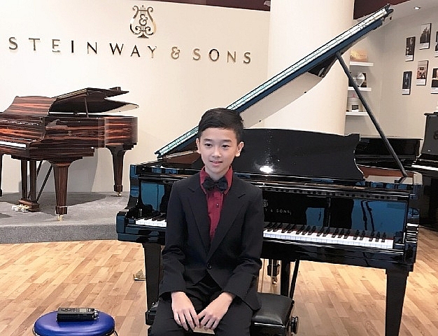 Bí quyết của thần đồng âm nhạc Võ Minh Quang bi quyet cua than dong am nhac vo minh quang